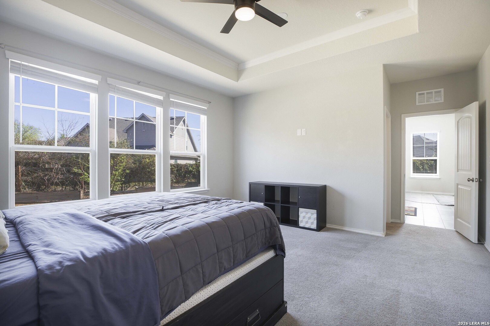 11638 Chalk Stem Schertz, TX 78154 - Photo 22 of 37 a bedroom with a bed closet and a large window
