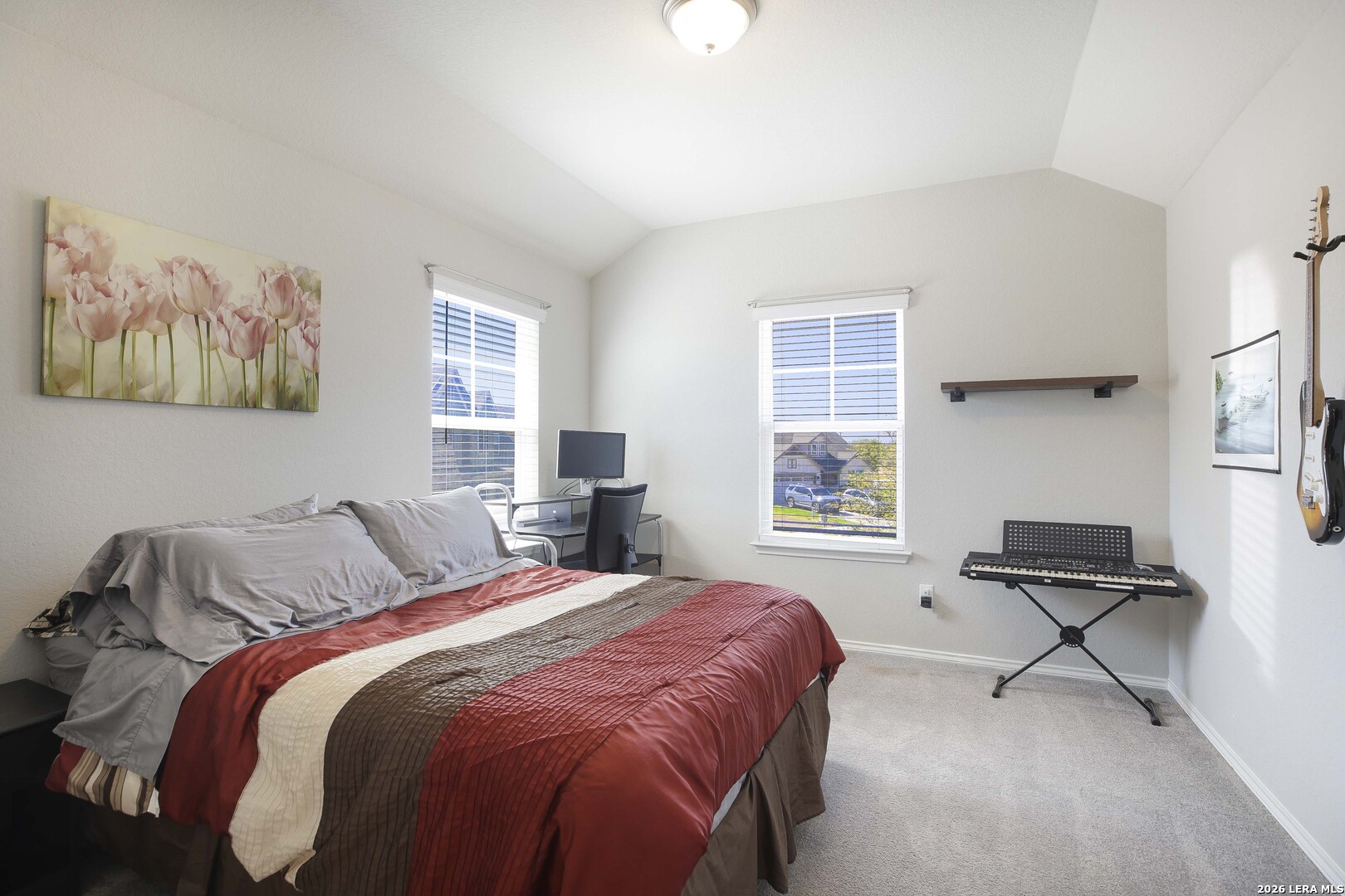 11638 Chalk Stem Schertz, TX 78154 - Photo 27 of 37 a bedroom with a bed and a window