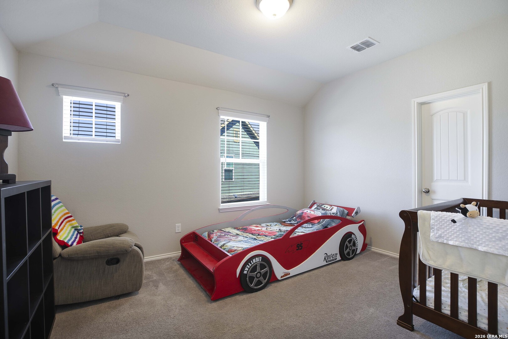 11638 Chalk Stem Schertz, TX 78154 - Photo 29 of 37 a bedroom with bed and a window