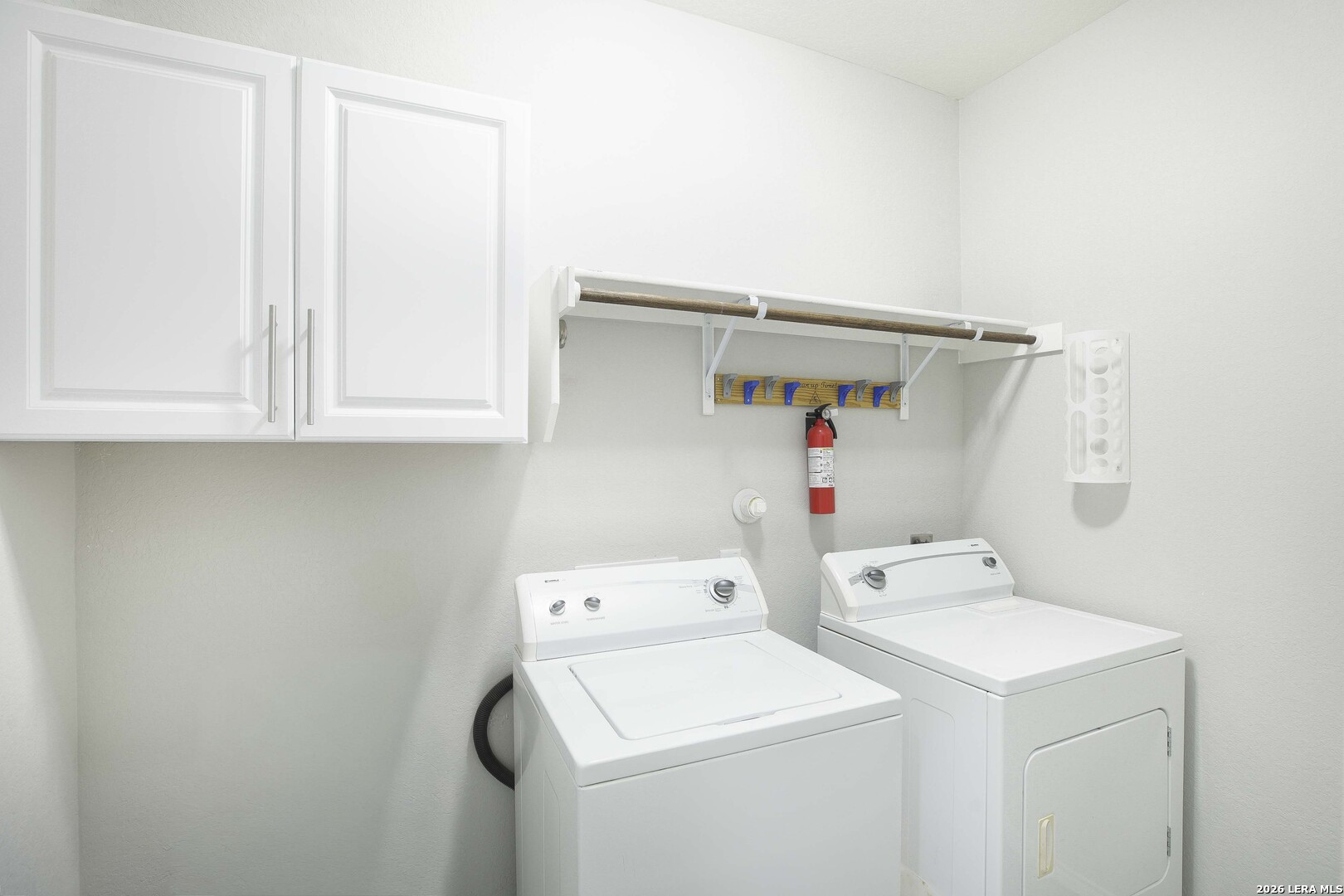 11638 Chalk Stem Schertz, TX 78154 - Photo 33 of 37 a utility room with dryer and washer