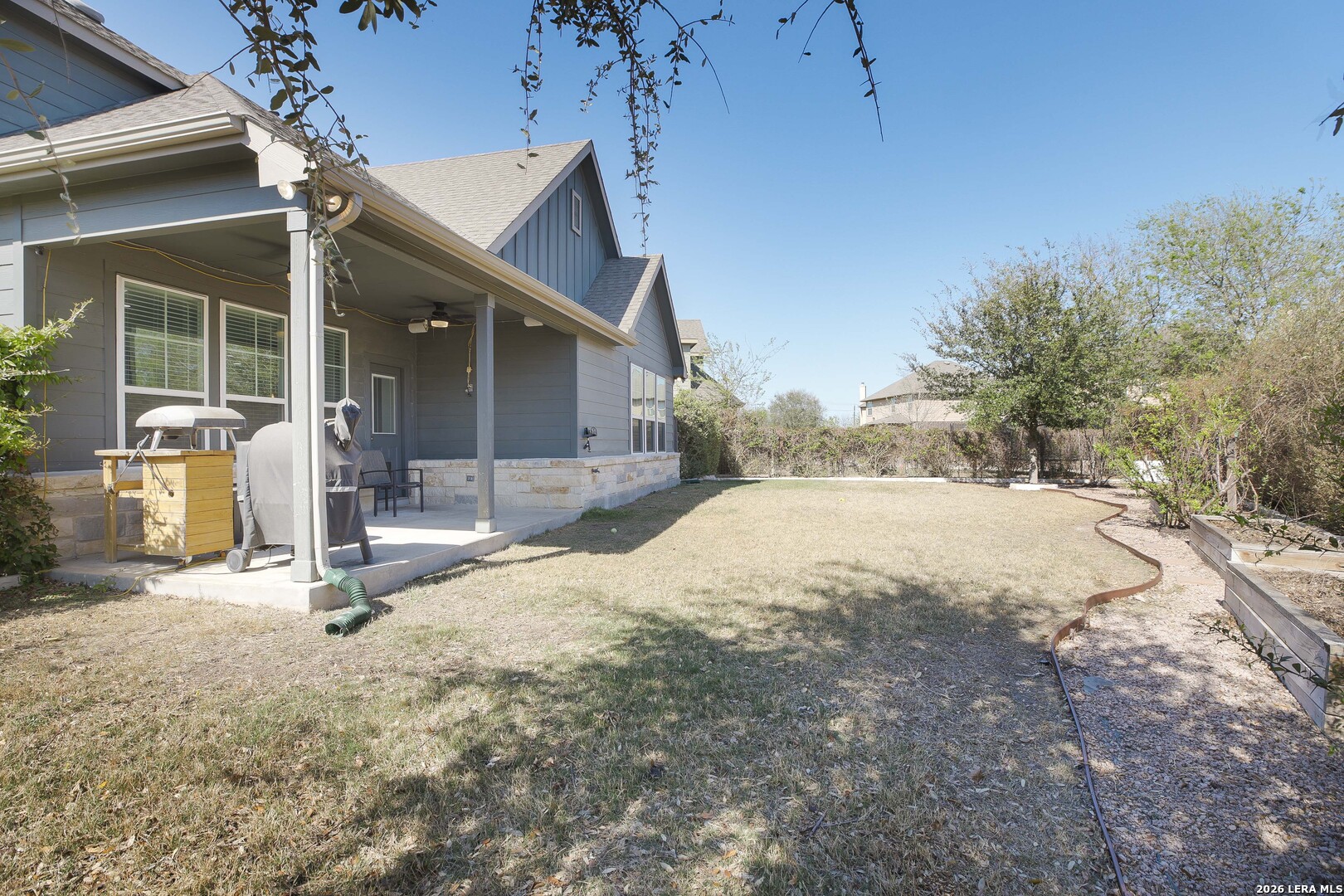 11638 Chalk Stem Schertz, TX 78154 - Photo 35 of 37 a view of backyard with sitting area