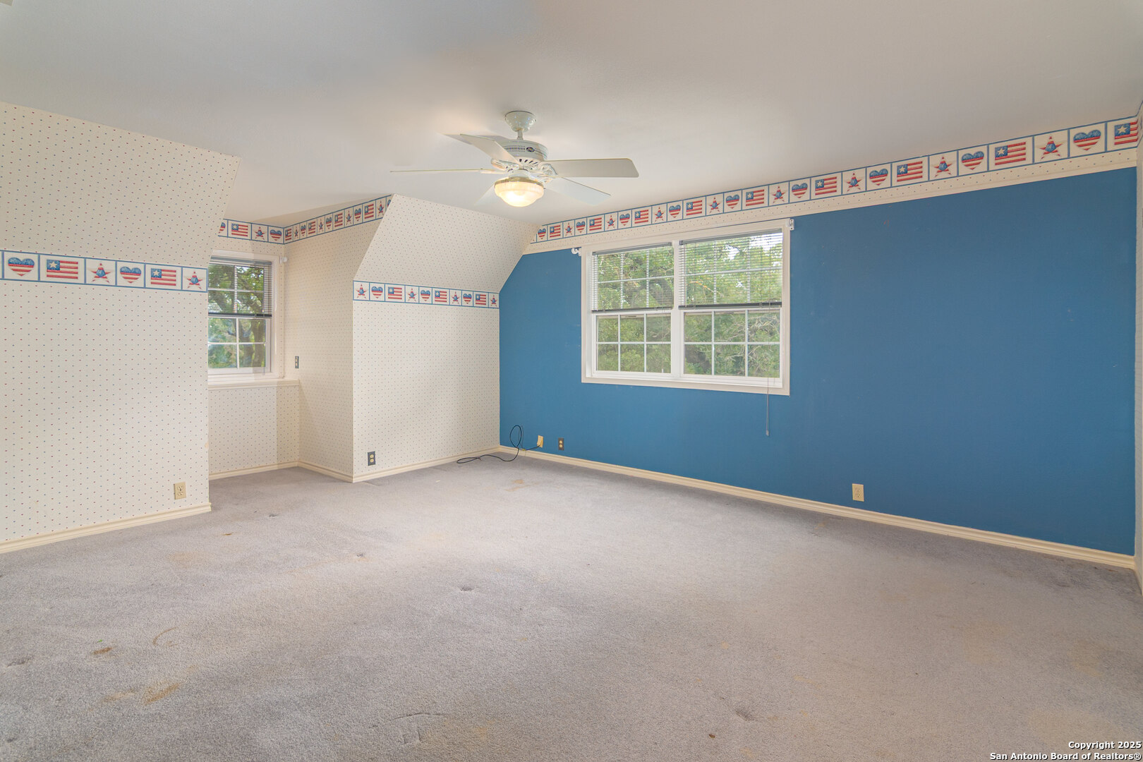 2981 Vivroux Ranch Road Seguin, TX 78155 - Photo 44 of 50 an empty room with windows and closet