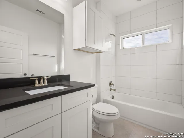 a view of a house with a patio