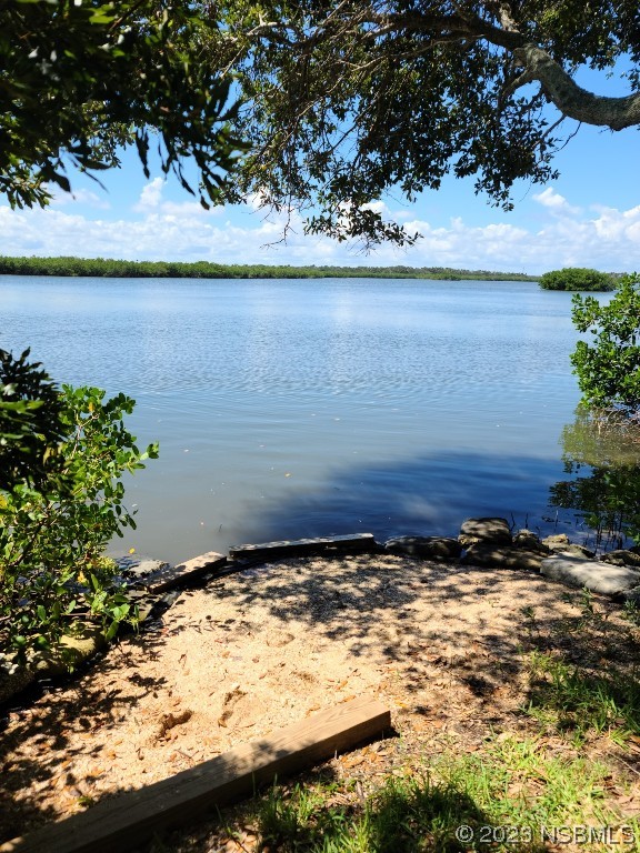 6544 Engram Road, Unit E203 New Smyrna Beach, FL 32169 - Photo 27 of 27 a view of a lake