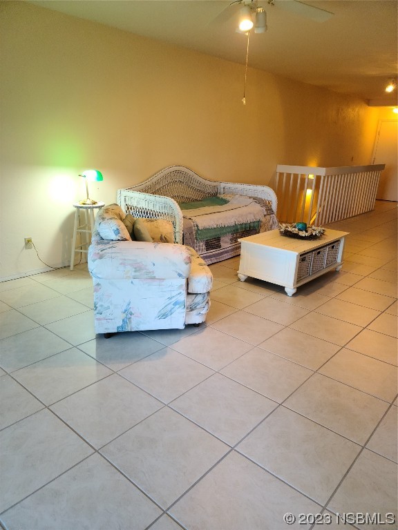 6544 Engram Road, Unit E203 New Smyrna Beach, FL 32169 - Photo 5 of 27 a living room with furniture and a table
