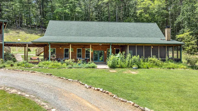 a view of entryway dining room and hall with wooden floor