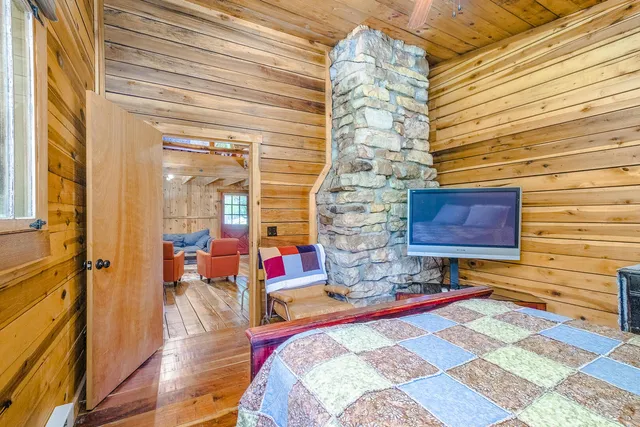 a bathroom with a double vanity sink toilet and shower