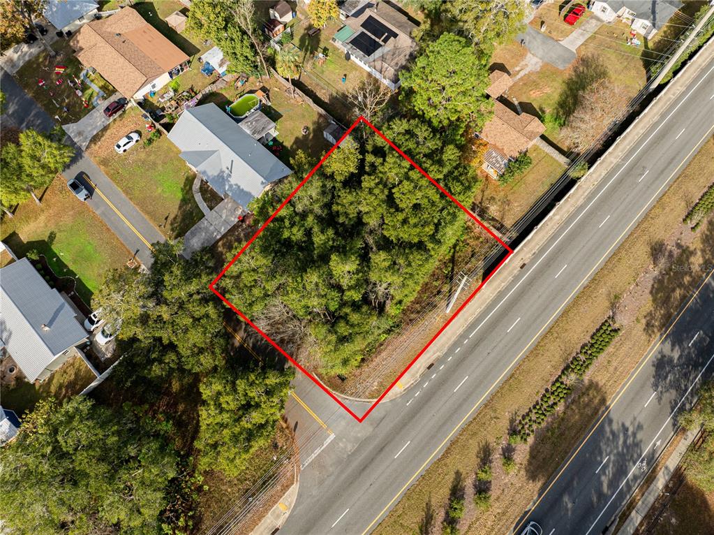 Southeast 4th Street Ocala, FL 34480 - Photo 3 of 13 an aerial view of a residential apartment building with a yard and potted plants