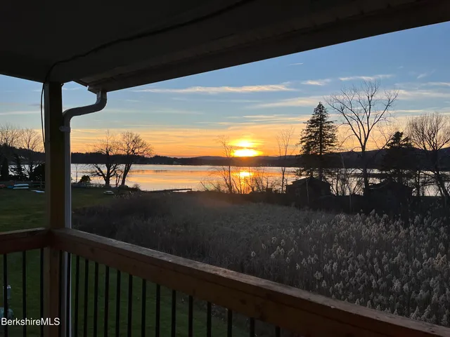 a view of a balcony from a yard