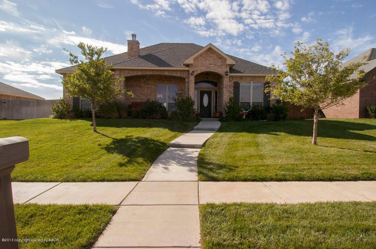 3807 Arden Road Amarillo, TX 79118 - Photo 2 of 26 a front view of a house with garden