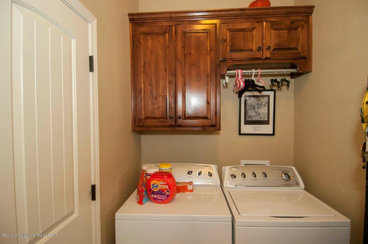 3807 Arden Road Amarillo, TX 79118 - Photo 22 of 26 a utility room with dryer and washer