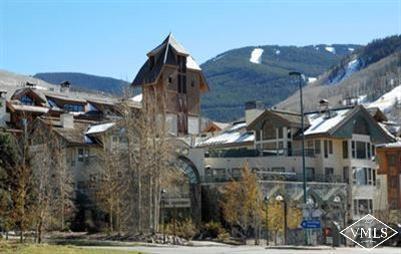a view of a house with a street
