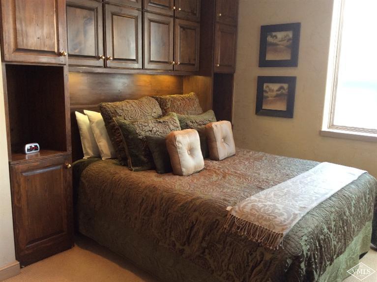 12 Vail Road, Unit R4 Vail, CO 81657 - Photo 9 of 23 a bedroom with a bed and window