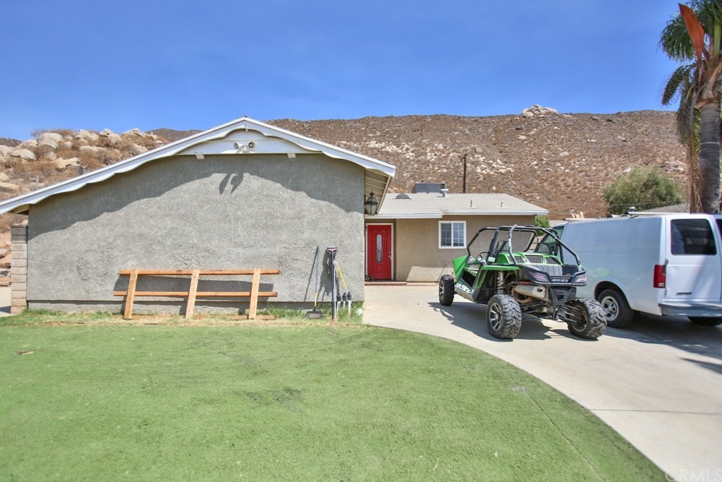 5953 Paramount Drive Riverside, CA 92509 - Photo 1 of 1 a view of a car park in front of house