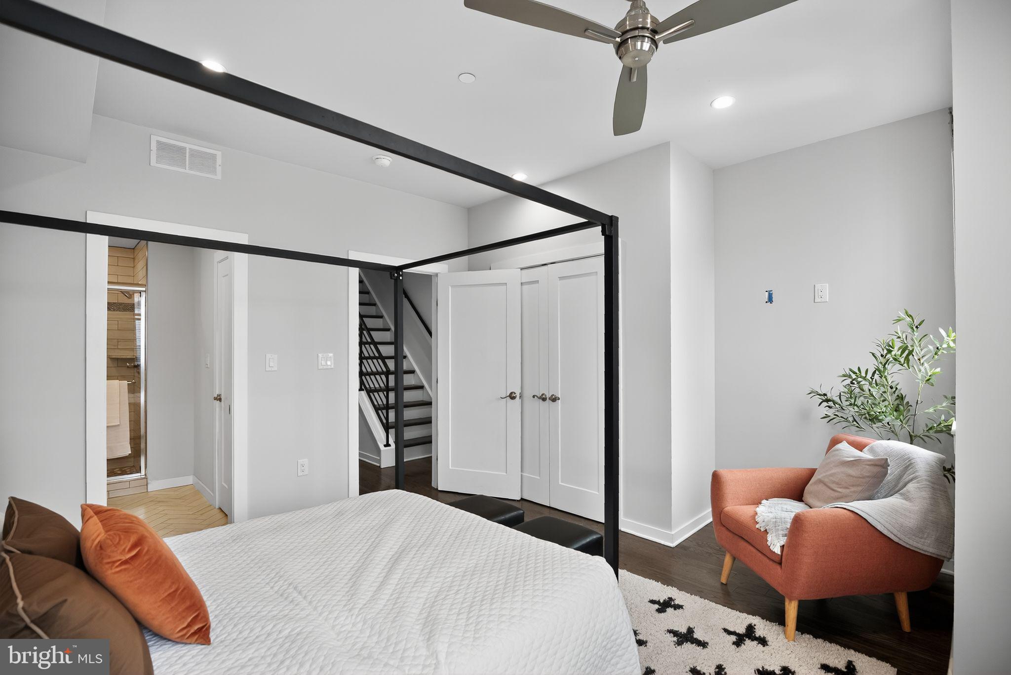 1711 South 20th Street Philadelphia, PA 19145 - Photo 16 of 36 a bedroom with a bed window and couch