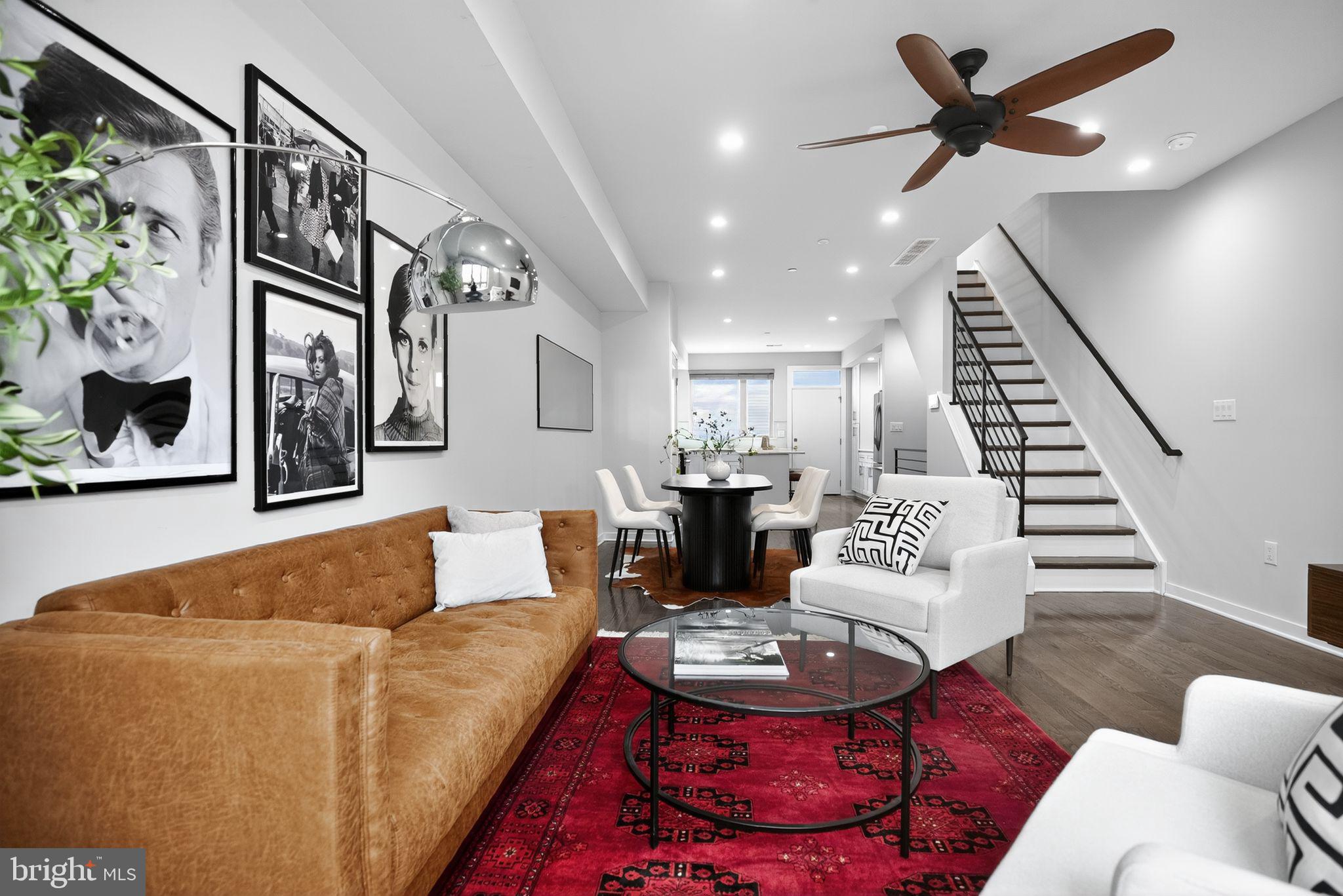 1711 South 20th Street Philadelphia, PA 19145 - Photo 2 of 36 a living room with furniture and wooden floor