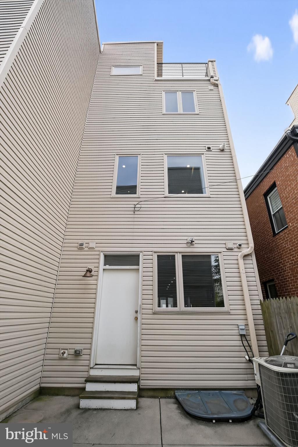 1711 South 20th Street Philadelphia, PA 19145 - Photo 29 of 36 a view of a house with a door and a window