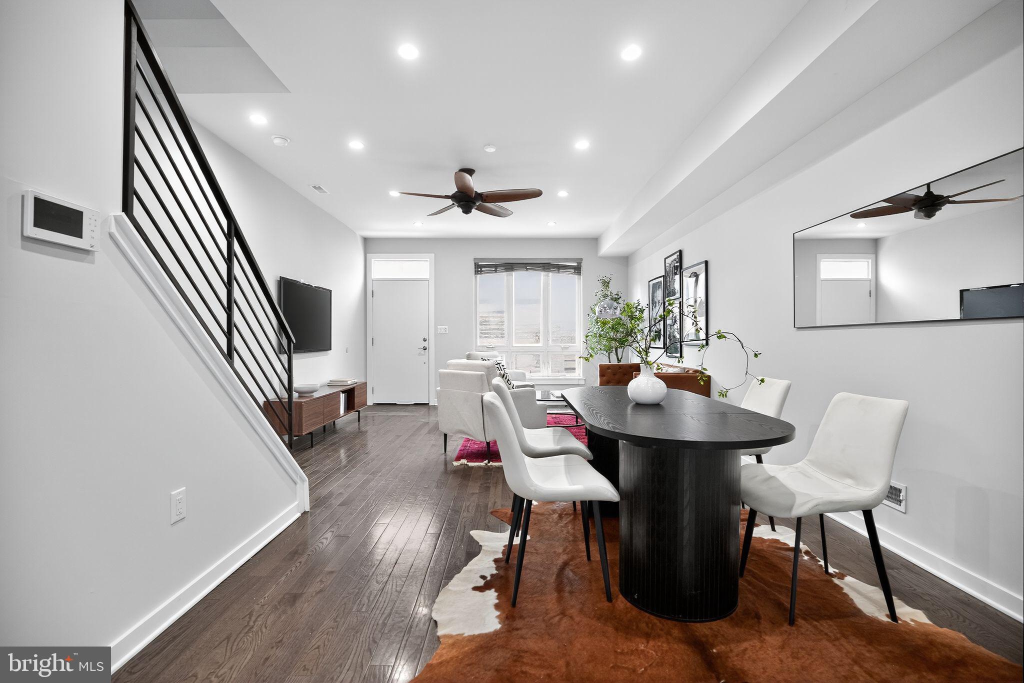 1711 South 20th Street Philadelphia, PA 19145 - Photo 4 of 36 a view of a dining room with furniture and wooden floor