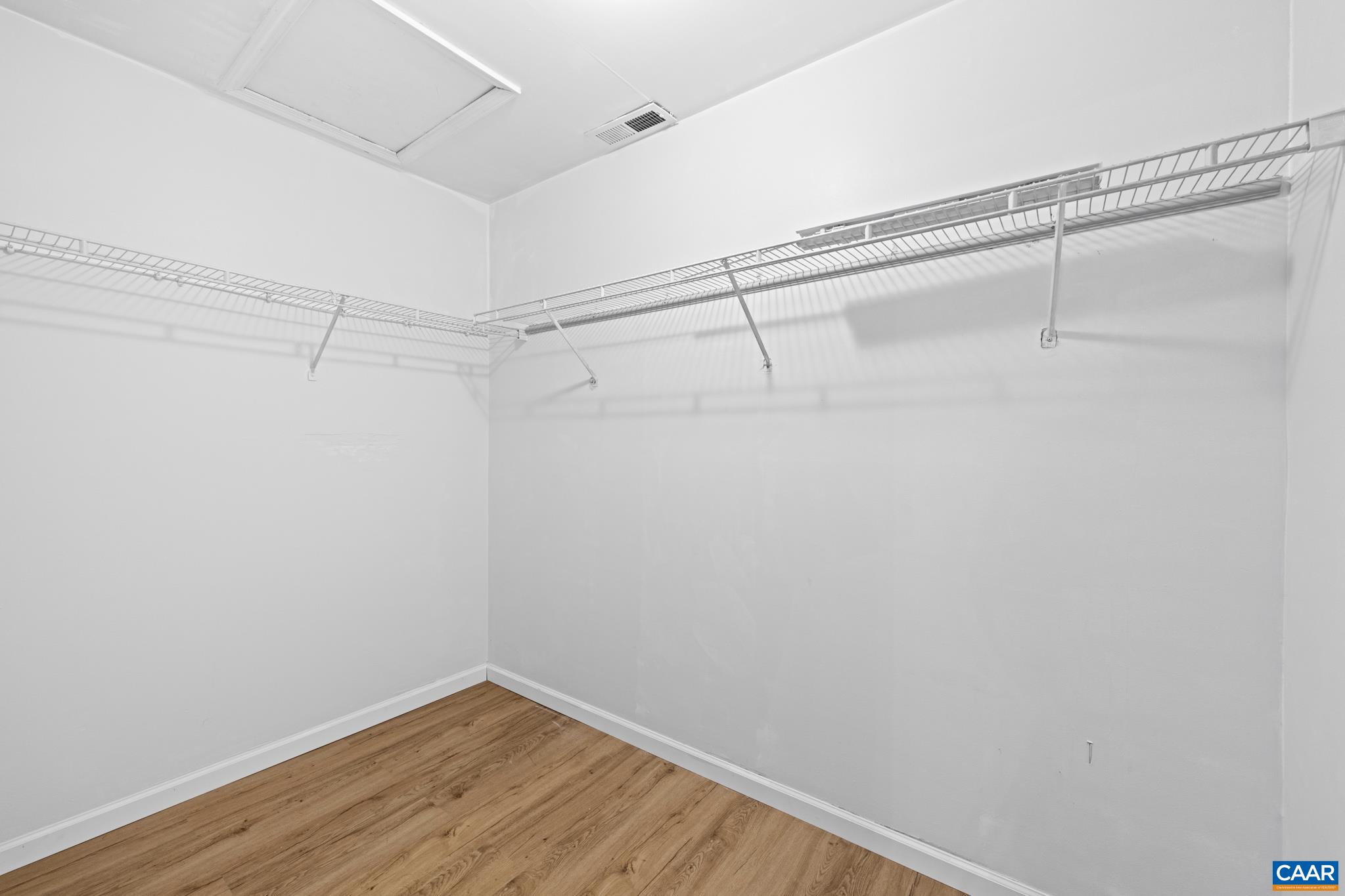 364 Larkspur Road Ruckersville, VA 22968 - Photo 21 of 29 a view of a room with racks on the wall