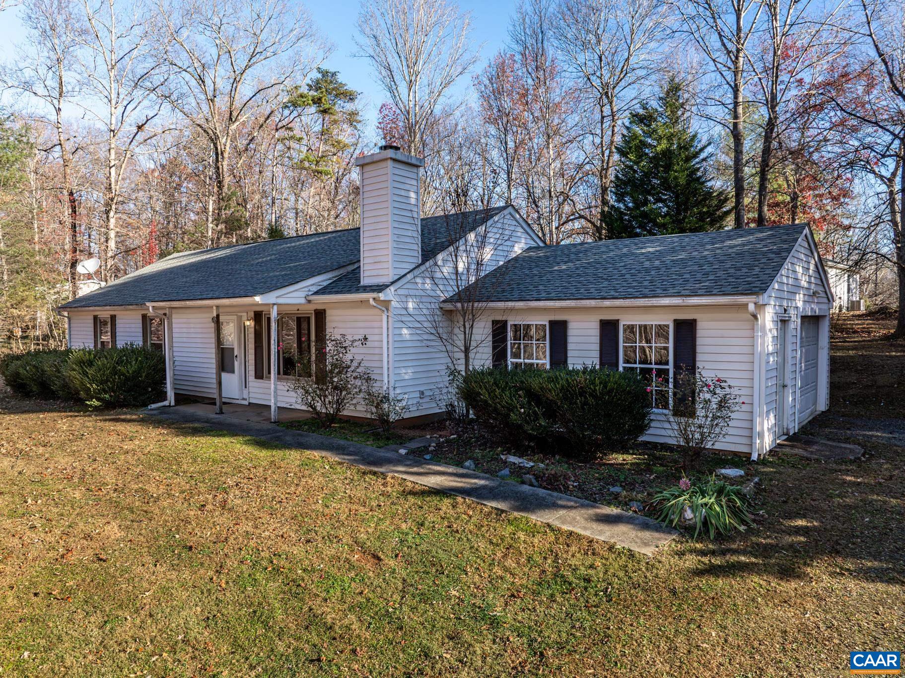 364 Larkspur Road Ruckersville, VA 22968 - Photo 3 of 29 a front view of a house with a yard