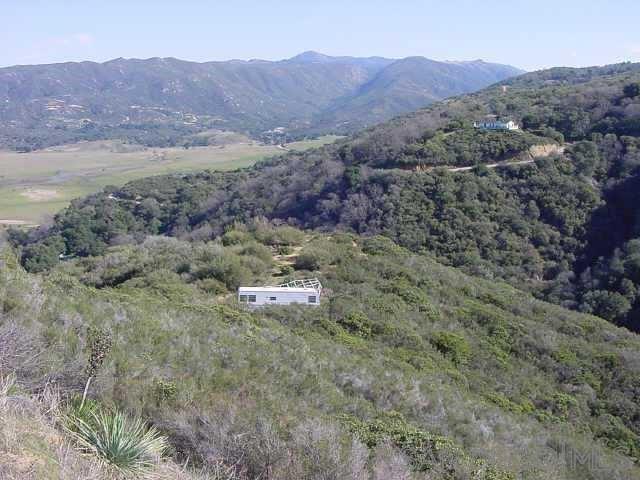 0 Bobcat Trail Santa Ysabel, CA 92070 - Photo 3 of 16 a view of a lush green hillside and houses