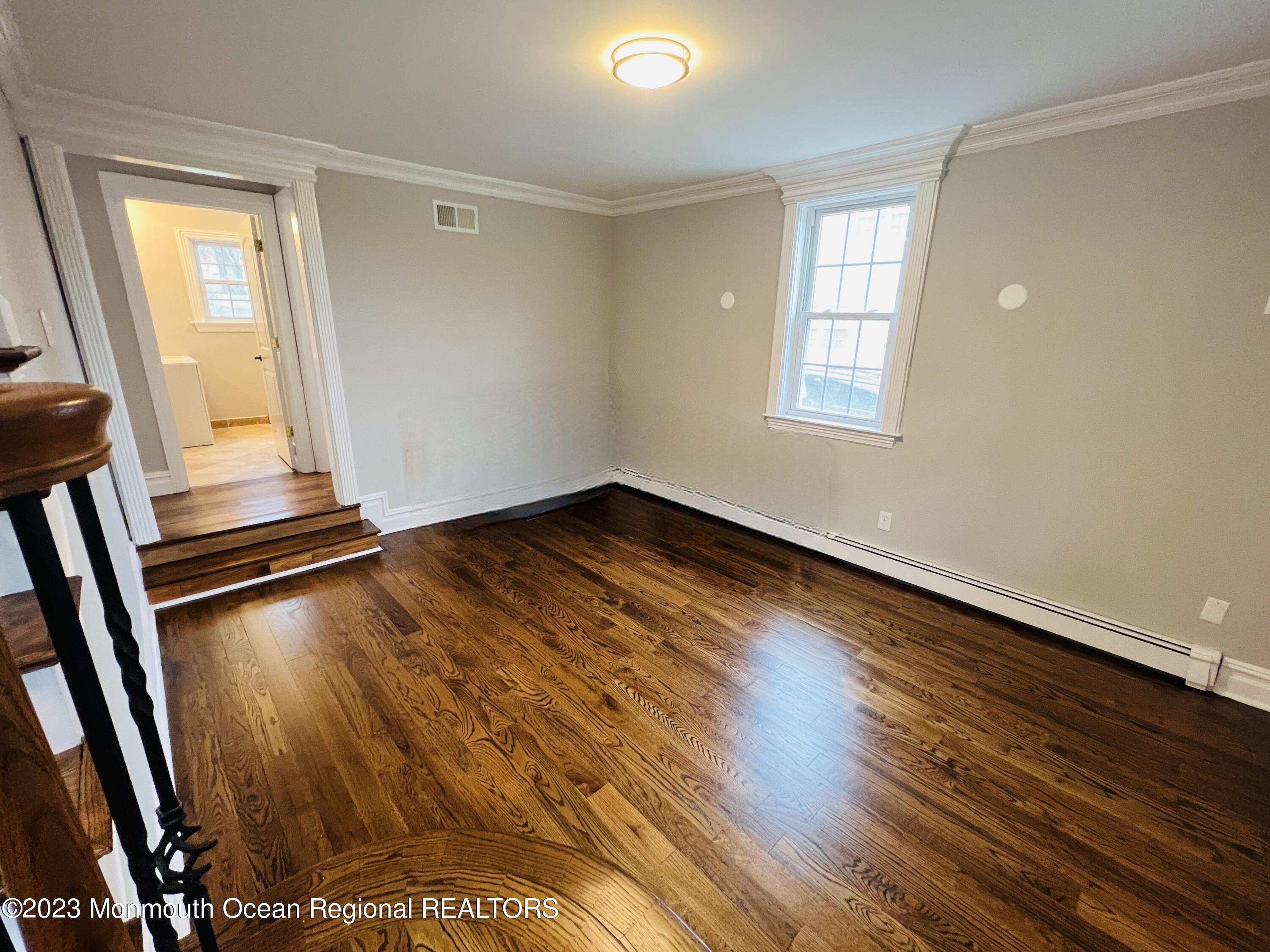 577 Newman Springs Road Marlboro, NJ 07746 - Photo 8 of 45 Living Room - Solid Oak Hardwood Floors