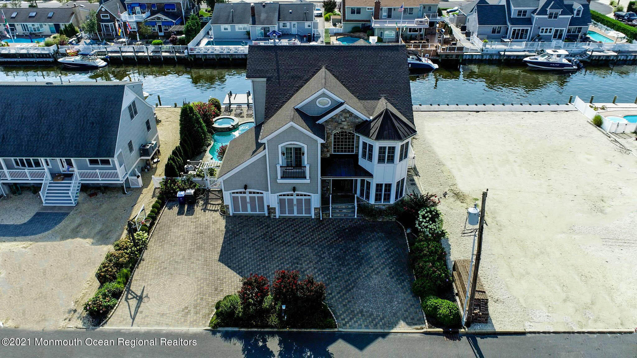 203 Ketch Road Mantoloking, NJ 08738 - Photo 1 of 88 an aerial view of residential houses with outdoor space