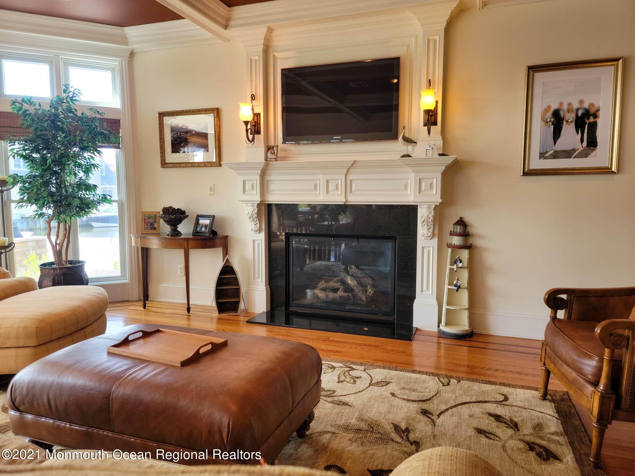 203 Ketch Road Mantoloking, NJ 08738 - Photo 20 of 88 a living room with furniture fireplace and flat screen tv