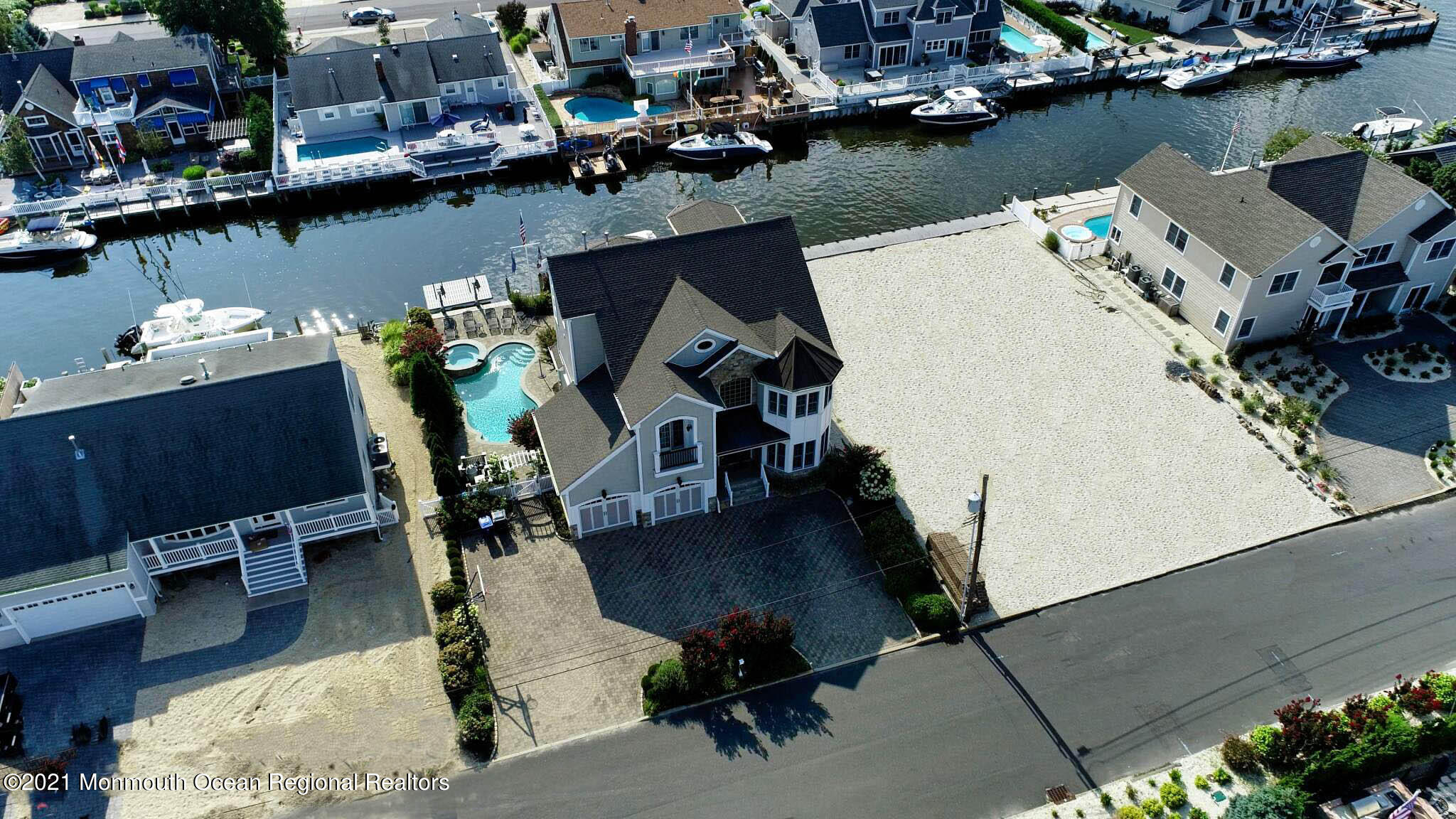 203 Ketch Road Mantoloking, NJ 08738 - Photo 3 of 88 an aerial view of a house with outdoor space