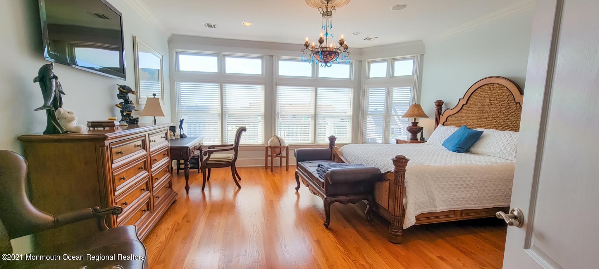 203 Ketch Road Mantoloking, NJ 08738 - Photo 39 of 88 a bedroom with furniture and a large window