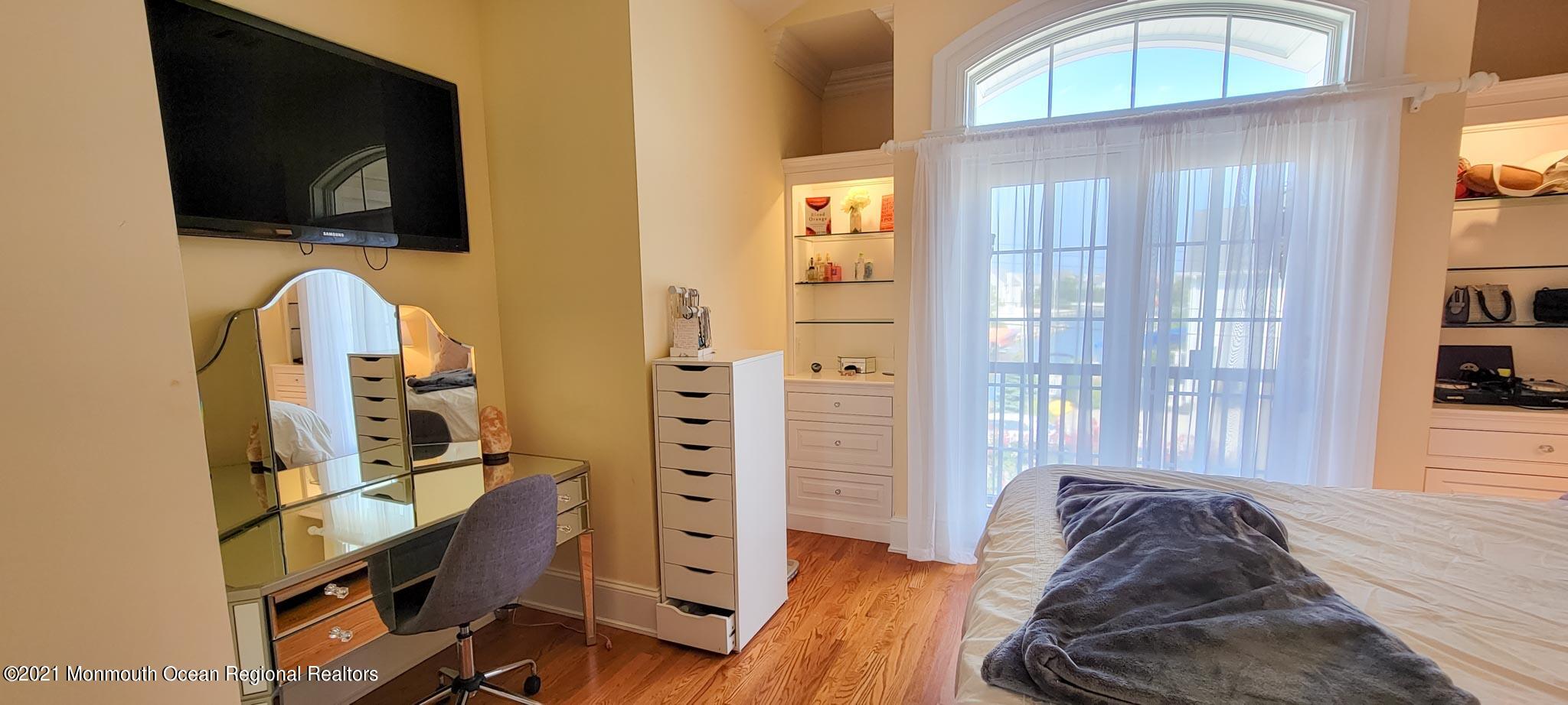 203 Ketch Road Mantoloking, NJ 08738 - Photo 49 of 88 a view of a livingroom with furniture and a flat screen tv