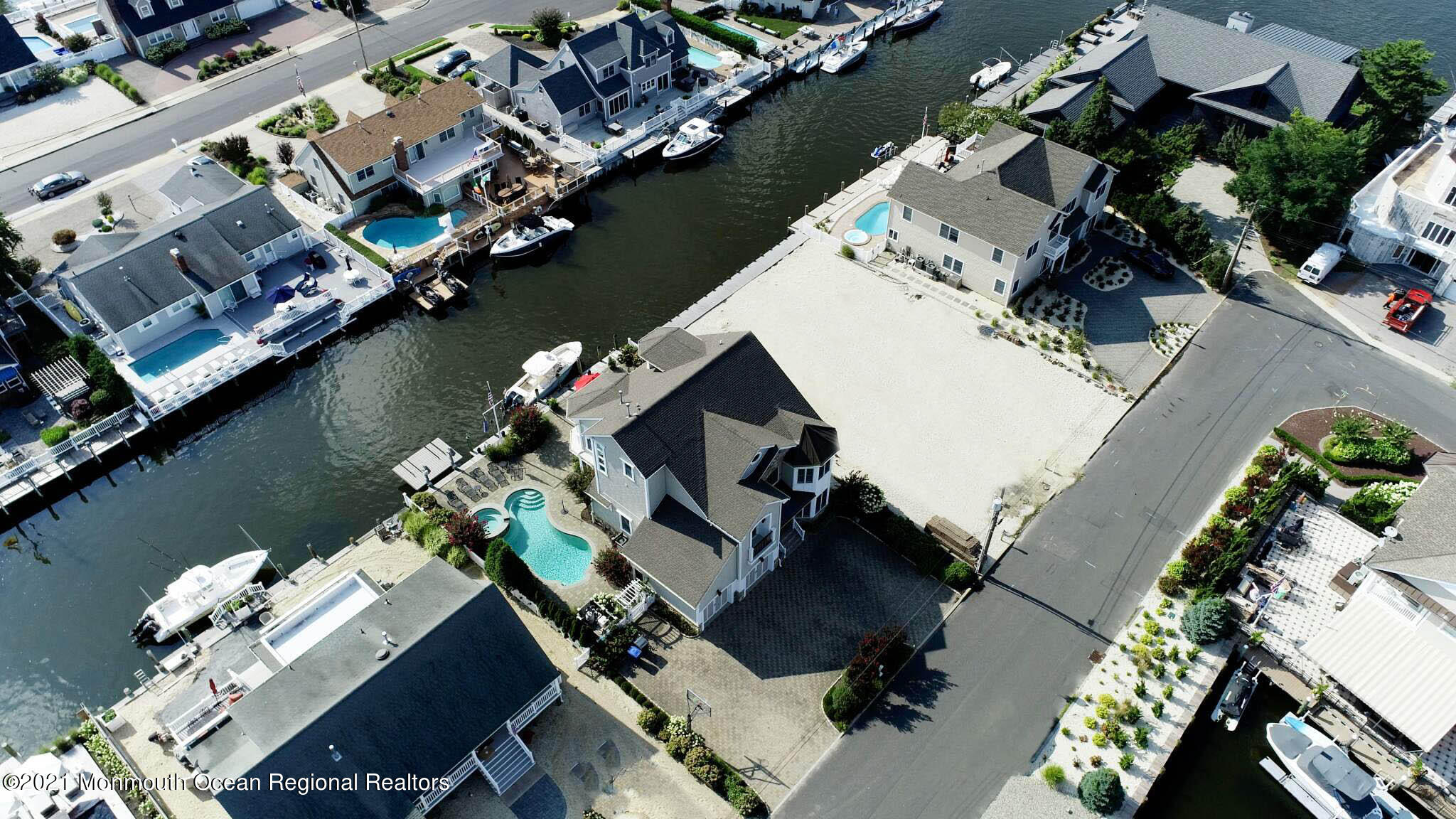 203 Ketch Road Mantoloking, NJ 08738 - Photo 6 of 88 an aerial view of a house with a ocean view