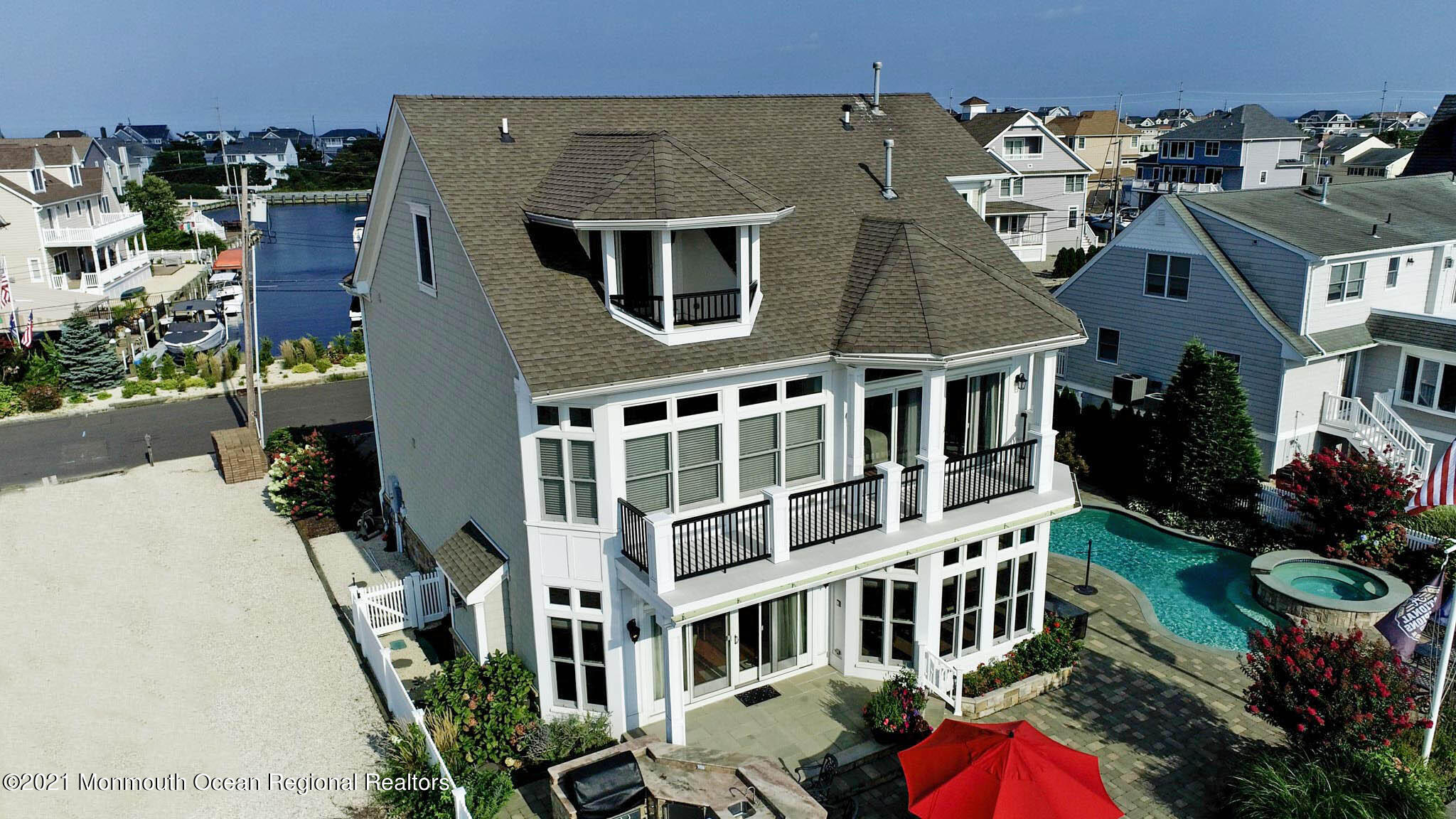 203 Ketch Road Mantoloking, NJ 08738 - Photo 7 of 88 an aerial view of a house with a yard
