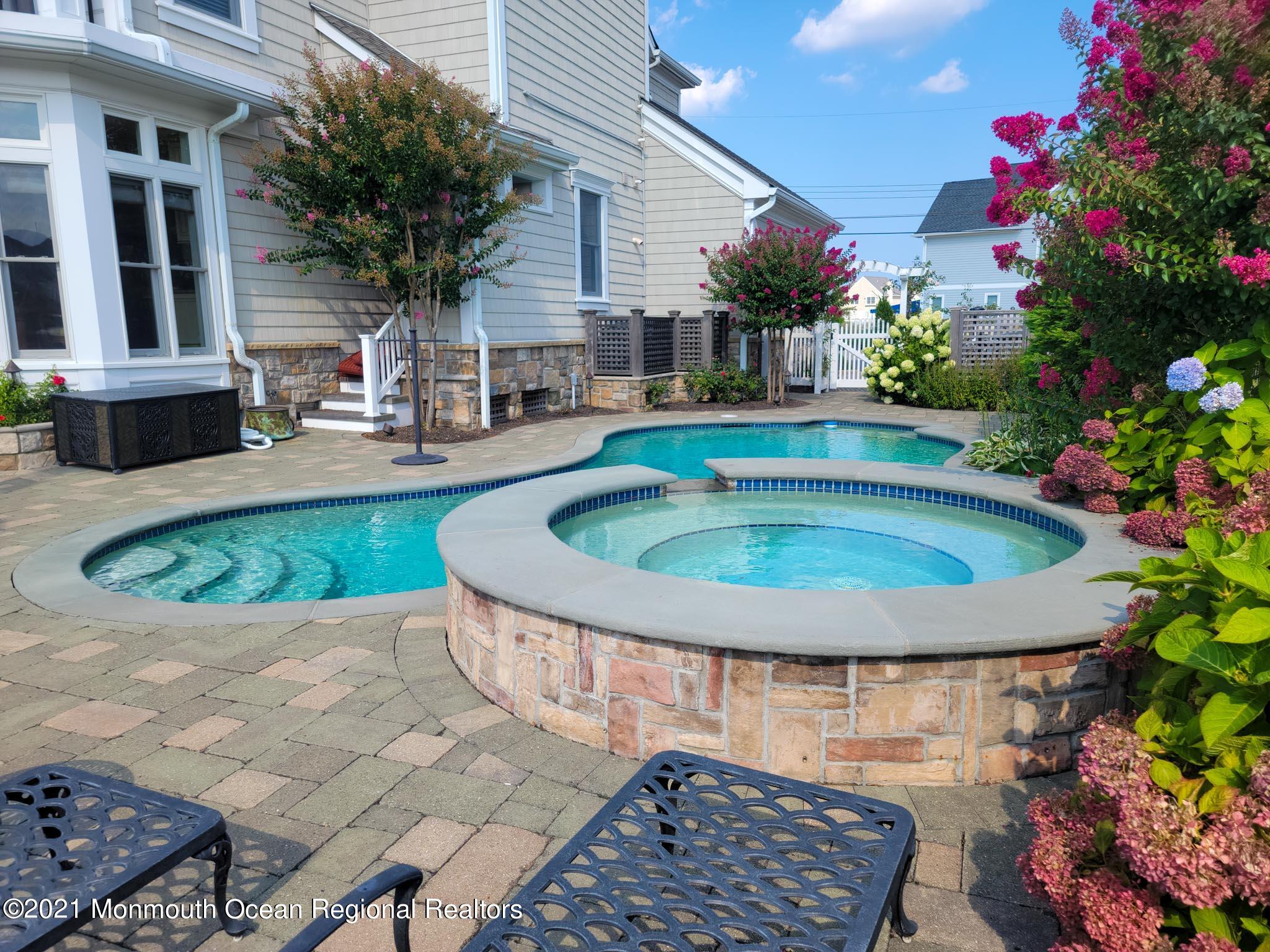 203 Ketch Road Mantoloking, NJ 08738 - Photo 76 of 88 a view of outdoor space yard deck patio and swimming pool