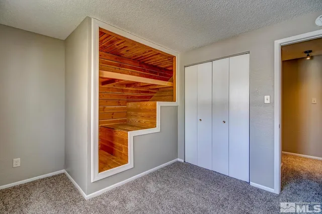 a view of an empty room with window