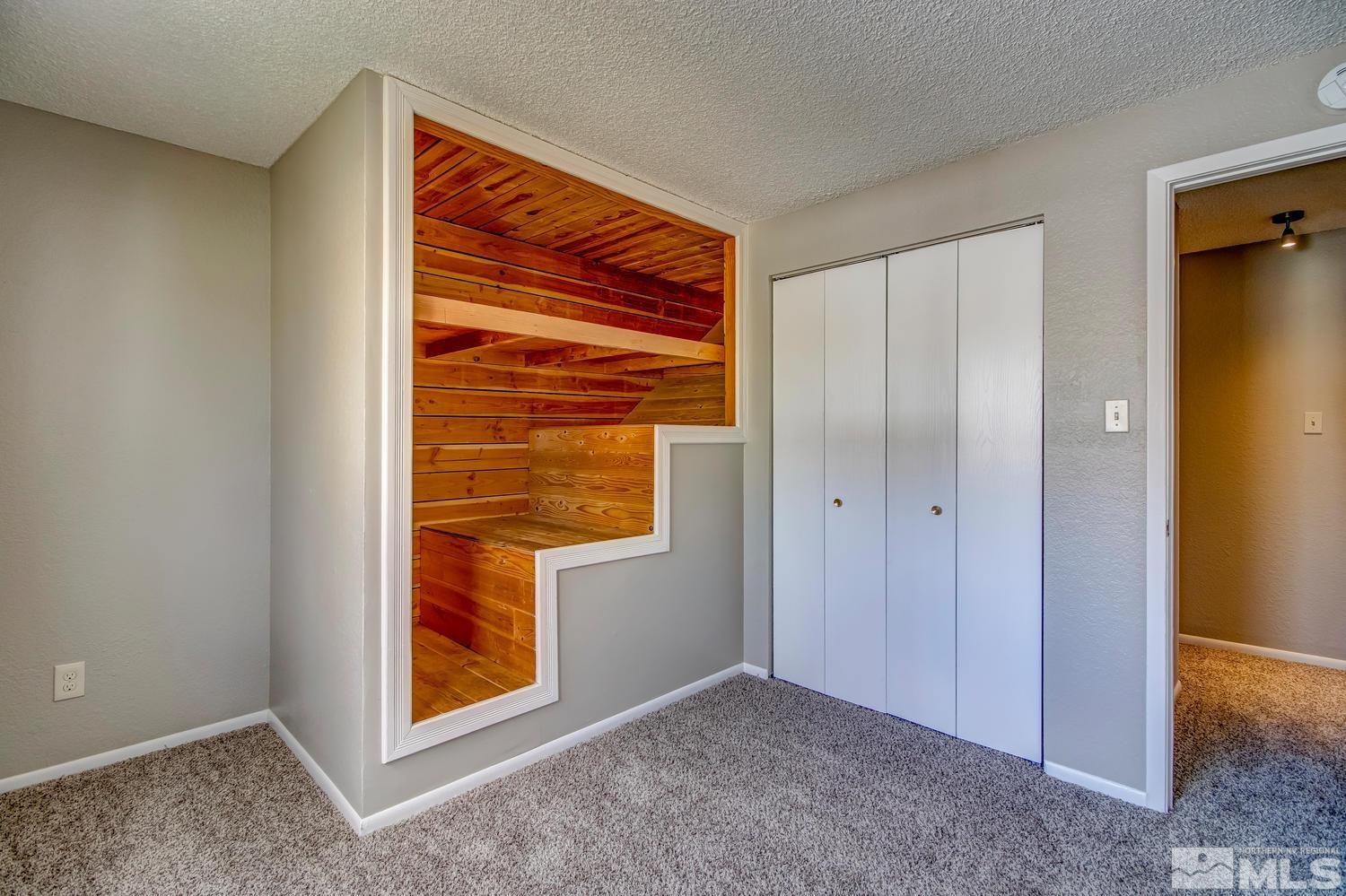 7513 Cumberland Circle Reno, NV 89511 - Photo 18 of 26 a view of an empty room with window