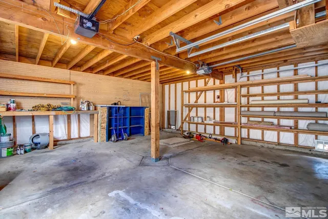 a view of a room with wooden walls