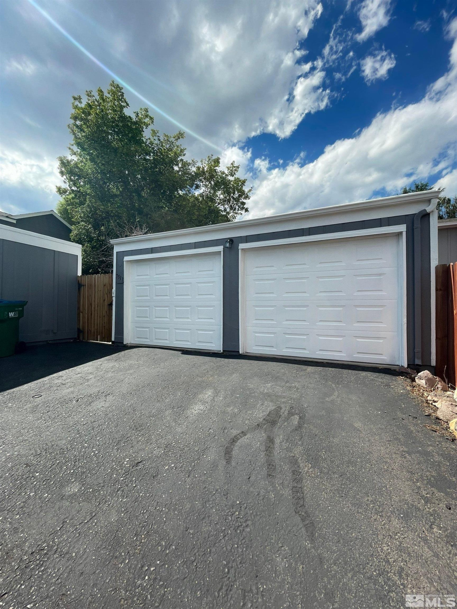 7513 Cumberland Circle Reno, NV 89511 - Photo 26 of 26 a view of garage and yard