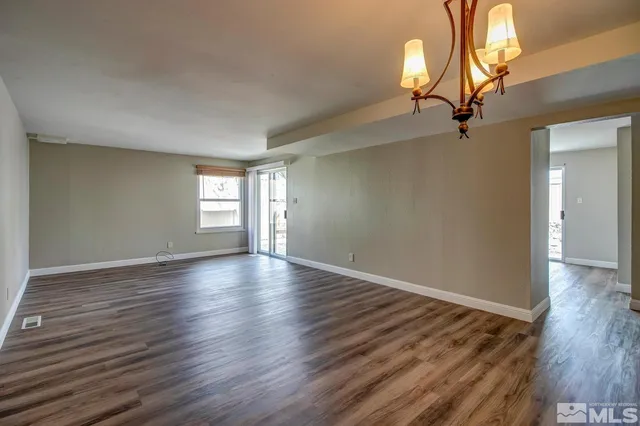 a view of livingroom with hardwood floor and window