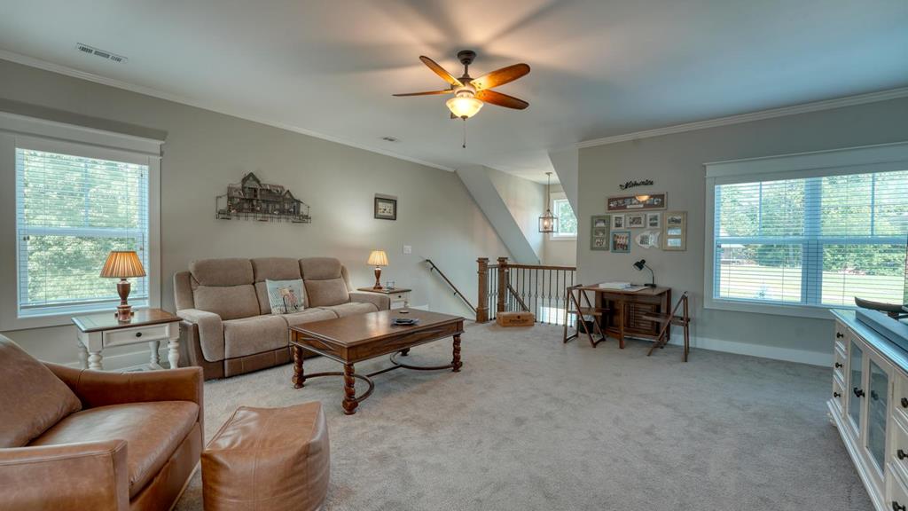 31 Elf School Road Hayesville, NC 28904 - Photo 41 of 59 a living room with furniture and a large window