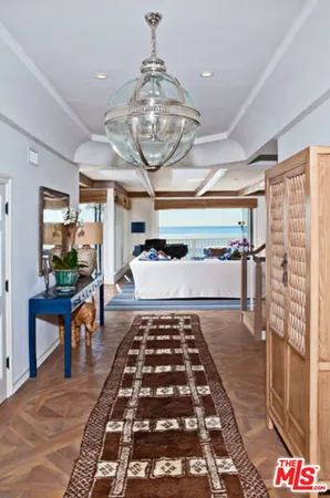 a picture of a room with furniture window and wooden floor