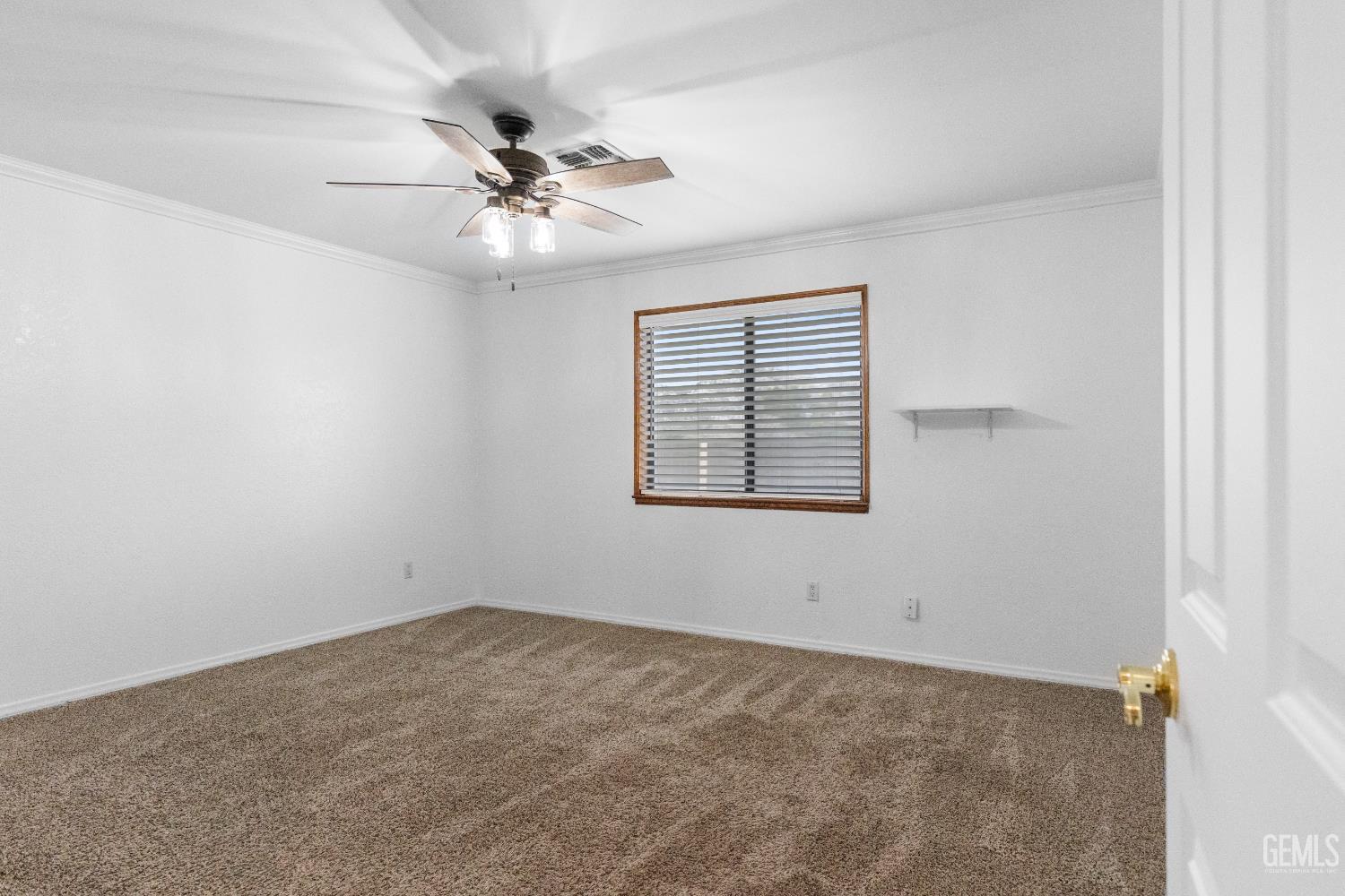 Undisclosed Address Tehachapi, CA 93561 - Photo 23 of 38 an empty room with a window and a fan