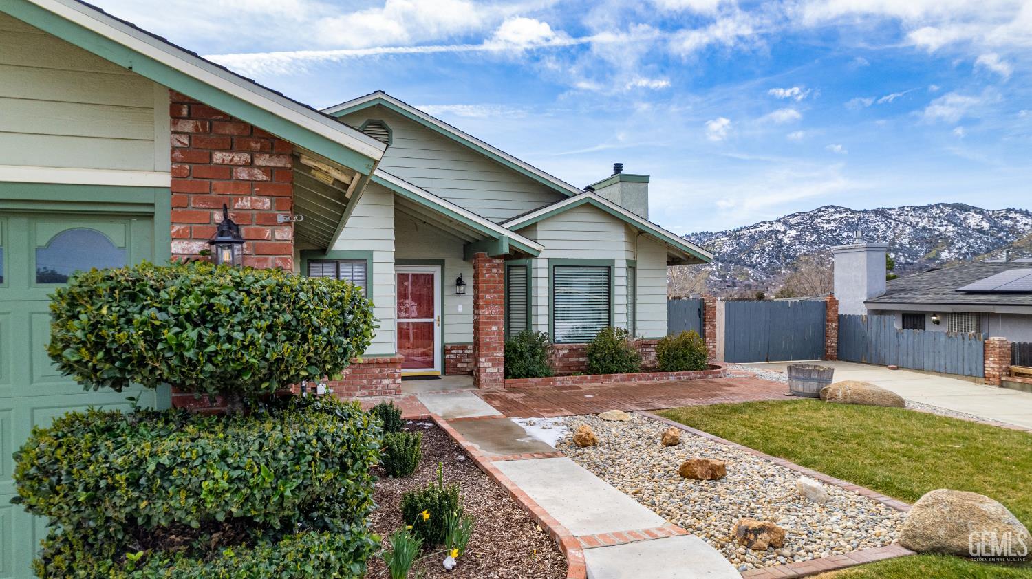 Undisclosed Address Tehachapi, CA 93561 - Photo 3 of 38 a front view of a house with garden