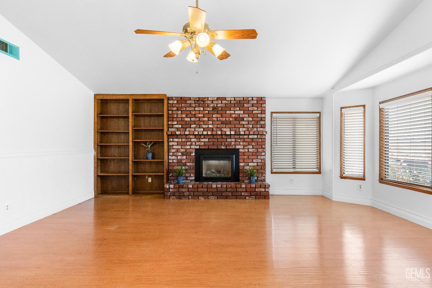 Undisclosed Address Tehachapi, CA 93561 - Photo 7 of 38 a living room with furniture a fireplace and a flat screen tv