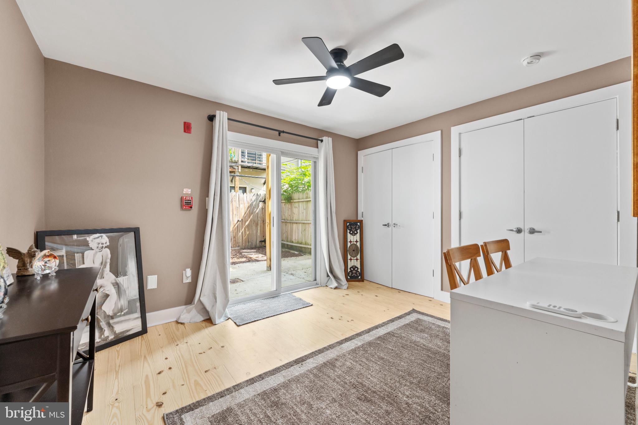 2123 Christian Street, Unit A Philadelphia, PA 19146 - Photo 9 of 15 a bedroom with furniture and a window