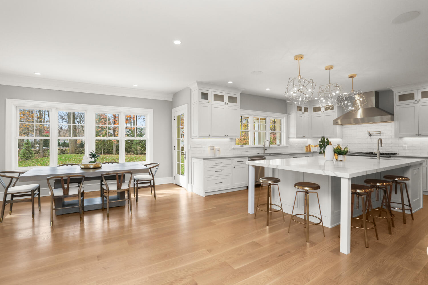 24 Country Club Road New Canaan, CT 06840 - Photo 15 of 43 a kitchen with counter top space and wooden floor