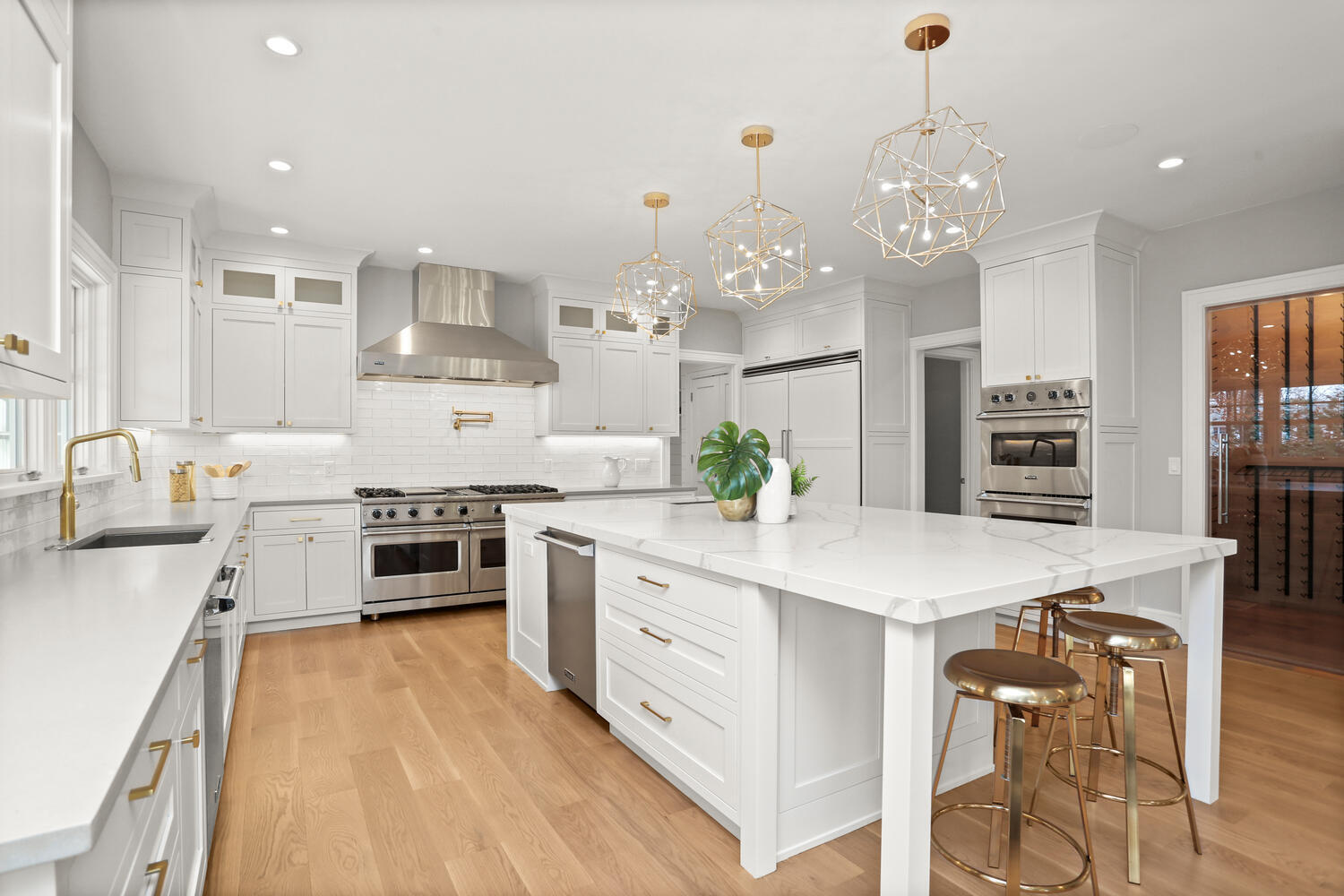24 Country Club Road New Canaan, CT 06840 - Photo 17 of 43 a kitchen with stainless steel appliances a stove sink and cabinets