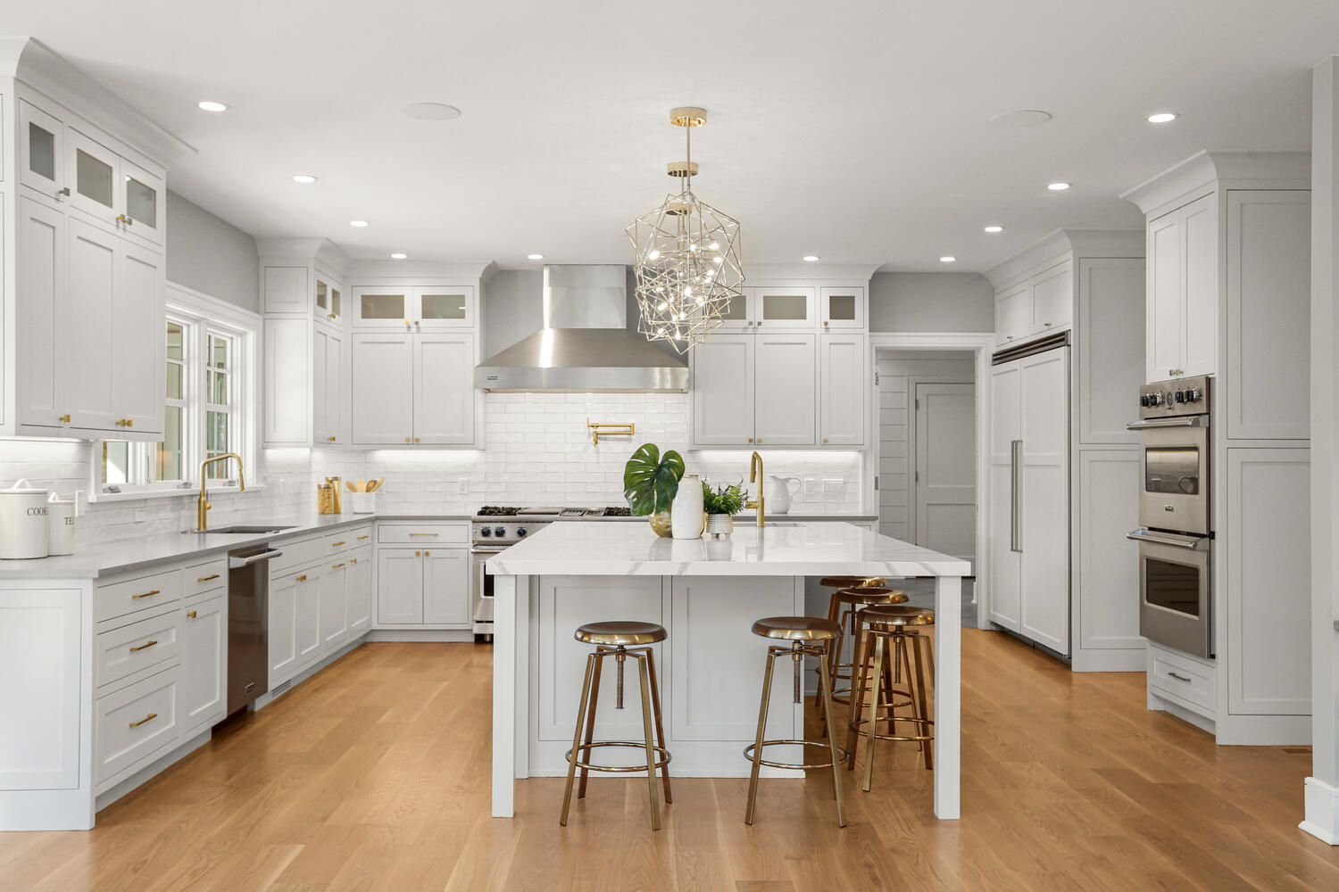 24 Country Club Road New Canaan, CT 06840 - Photo 19 of 43 a kitchen with stainless steel appliances granite countertop a table chairs refrigerator and sink