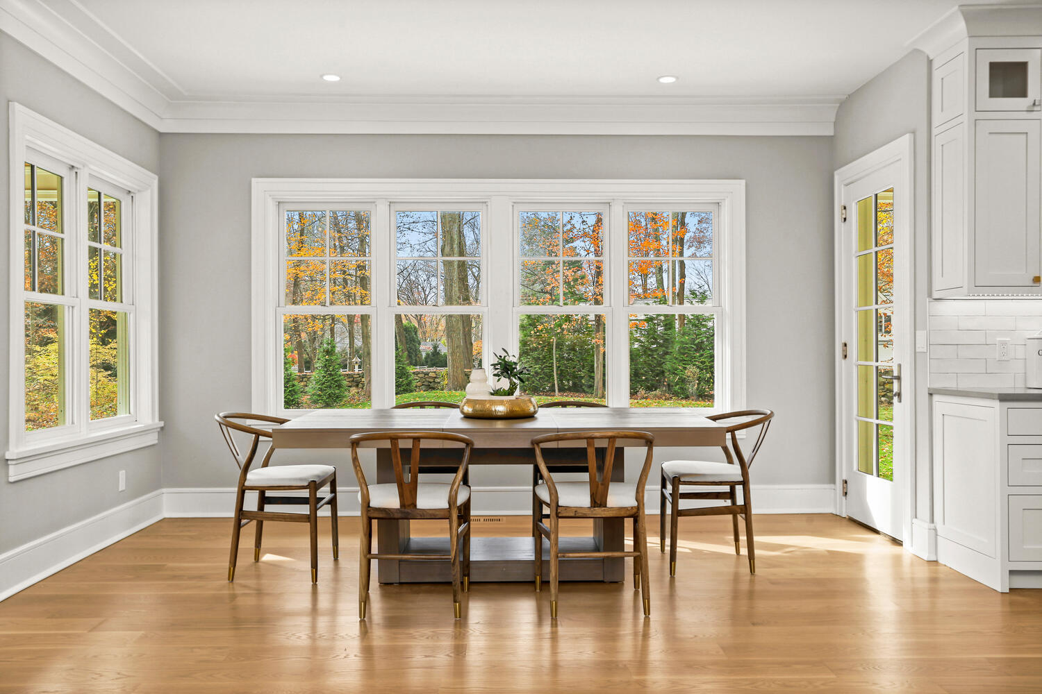 24 Country Club Road New Canaan, CT 06840 - Photo 21 of 43 a view of a dining room with furniture window and wooden floor