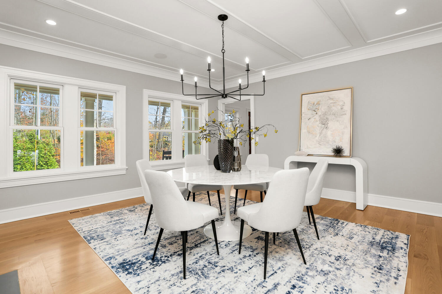 24 Country Club Road New Canaan, CT 06840 - Photo 22 of 43 a dining room with furniture a chandelier and wooden floor
